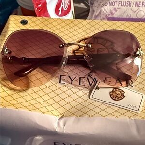 Rimless Sunglasses with Pink Gradient Lenses